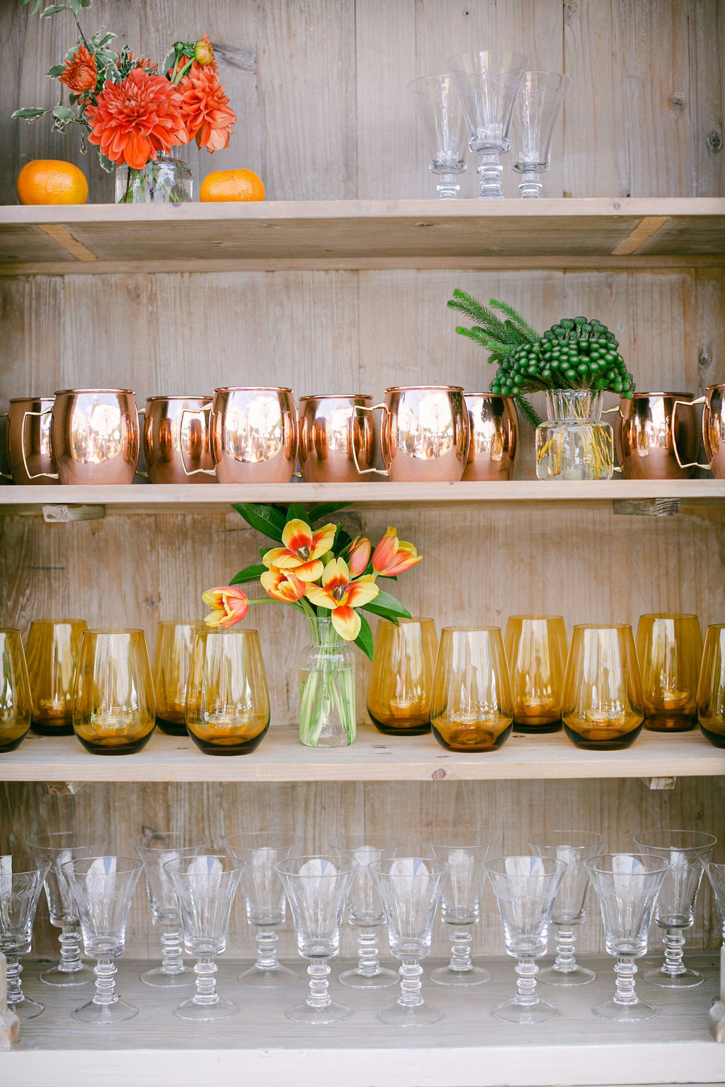 A shelf with cups and glasses